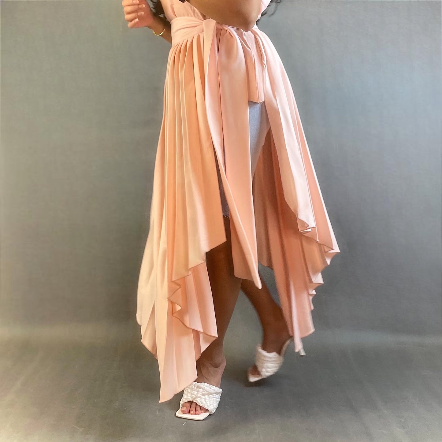 Asymmetrical pleated belt