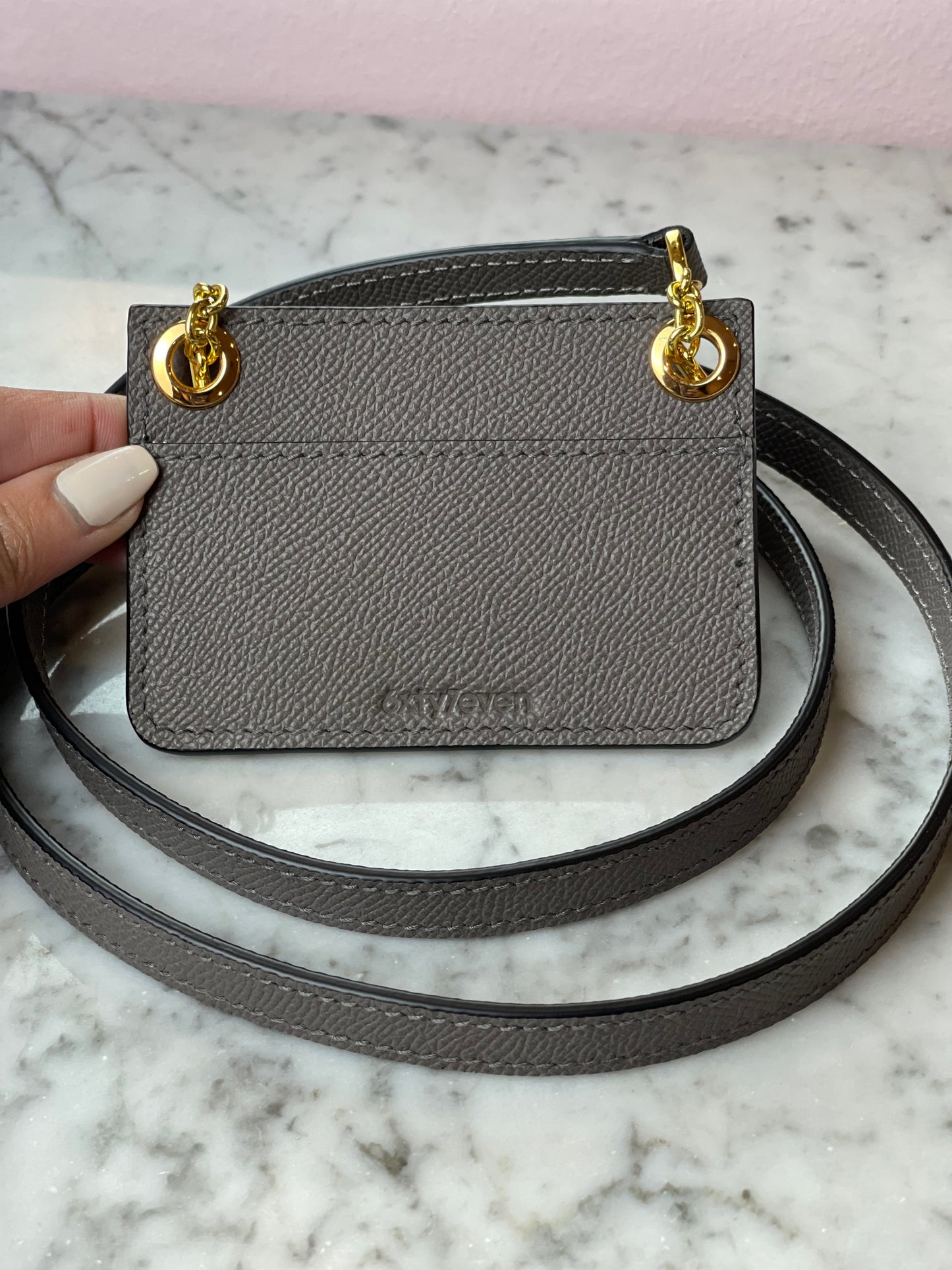 Card-holder with strap