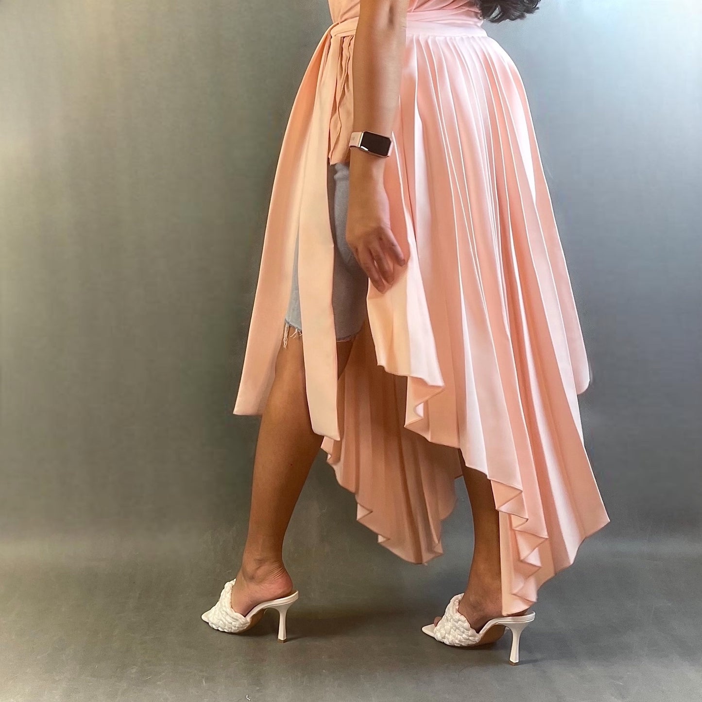 Asymmetrical pleated belt