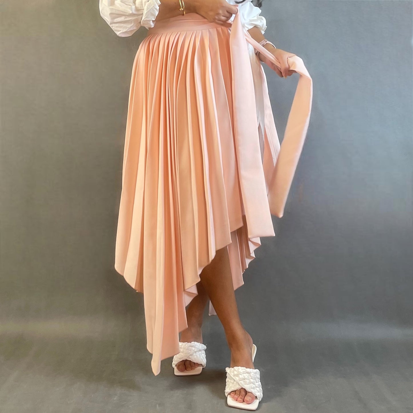 Asymmetrical pleated belt